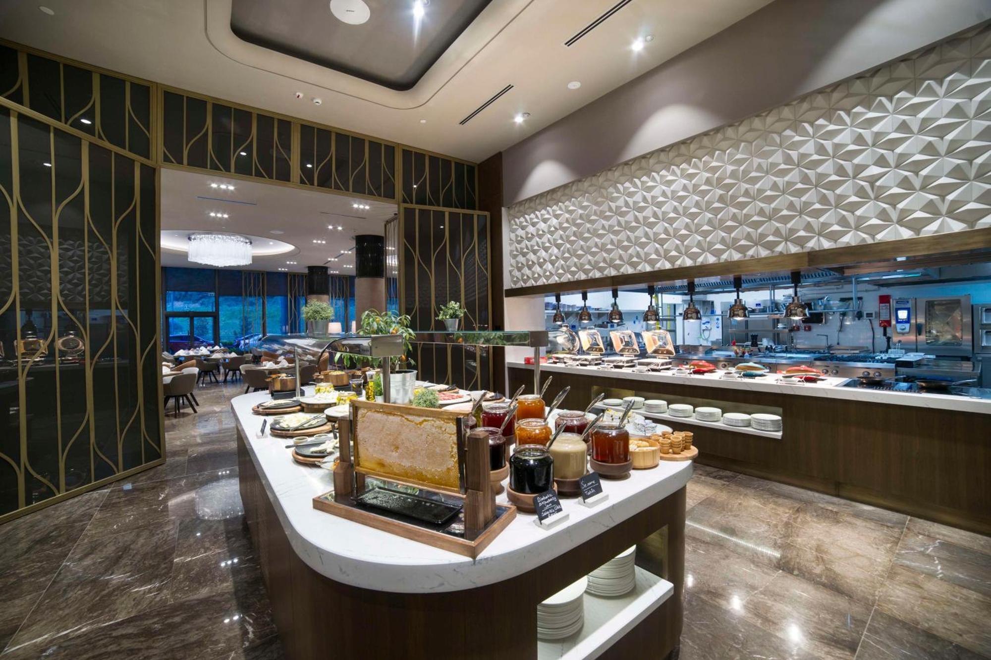 Radisson Collection Hotel, Vadistanbul Exterior foto The buffet at the lounge